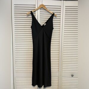 Elegant Black Sleeveless Dress
A new Day size XS